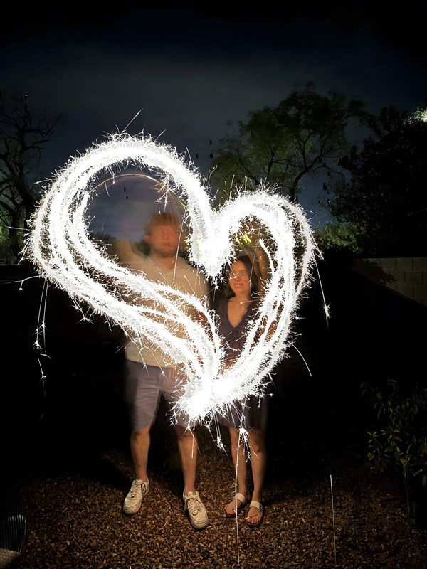 A heart drawn in sparkler light